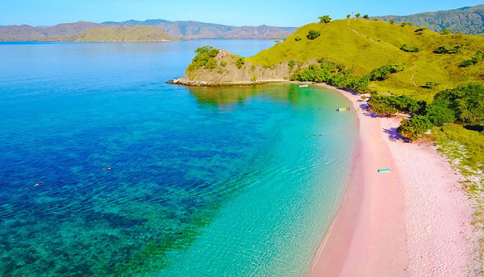 Pink Beach, also known as Pantai Merah, is a stunning natural wonder located on the island of Komodo in Indonesia. What makes this beach unique is its pink sand, which is a result of a mixture of white sand and red coral fragments. The beach is not only beautiful but also offers a variety of water activities, making it a must-visit destination for travelers who are looking for a unique and memorable experience.