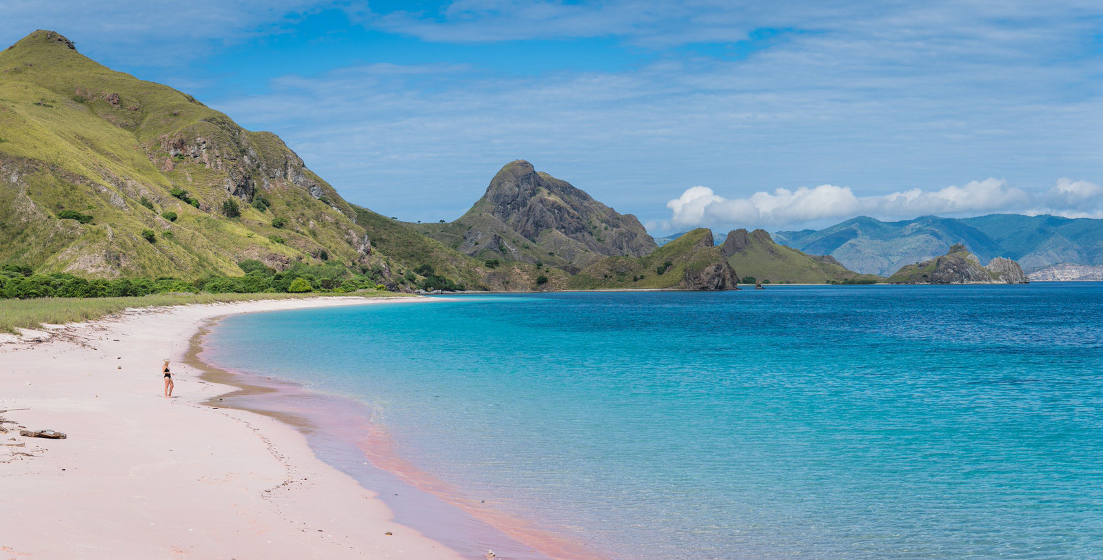 Pink Beach, also known as Pantai Merah, is a stunning natural wonder located on the island of Komodo in Indonesia. What makes this beach unique is its pink sand, which is a result of a mixture of white sand and red coral fragments. The beach is not only beautiful but also offers a variety of water activities, making it a must-visit destination for travelers who are looking for a unique and memorable experience.